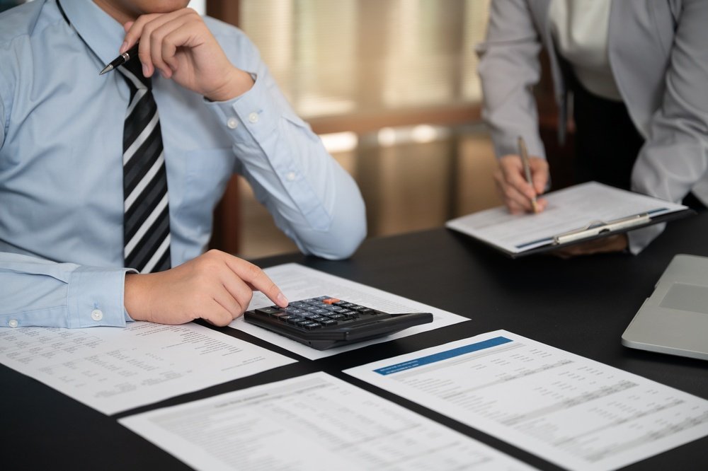 Finance,And,Accountant,Team,Working,In,Office,For,Accounting,And